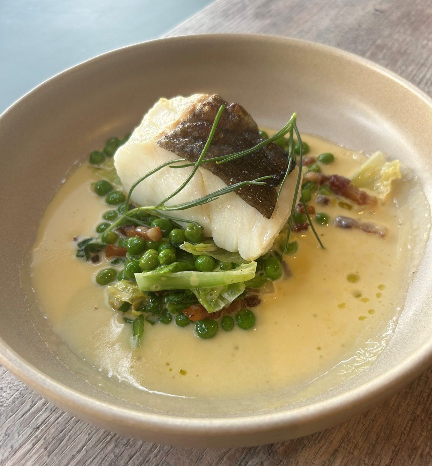 The mouth-watering baked cod with peas a la Francaise.