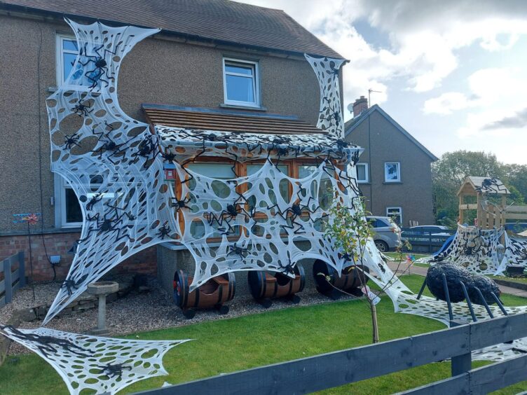 The spider's web Halloween decorations outside the house in Brechin