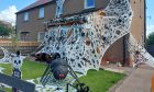 The spider's web Halloween decorations outside the house in Brechin