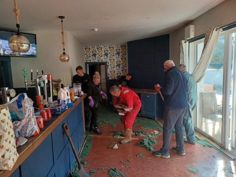 Bridgend Bar clear up in Brechin after Storm Babet.