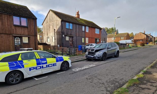 Police remained at the scene of the car fire in Dundee