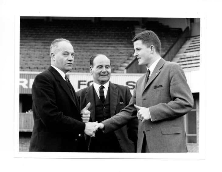Andy Dickson and manager Jerry Kerr welcome Finn Dossing to Tannadice in 1964