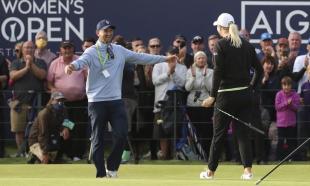 Kevin McAlpine and Anna Nordqvist embracing at Carnoustie in 2021.