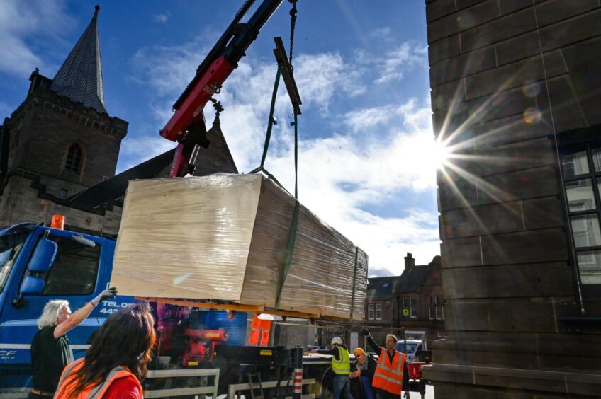 Large wooden crate arriving at Perth Museum by crane