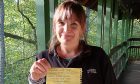 Ruth Alexander, National Trust for Scotland ranger at Killiecrankie Visitor Centre, with a message written nine years earlier that was found in a bottle.