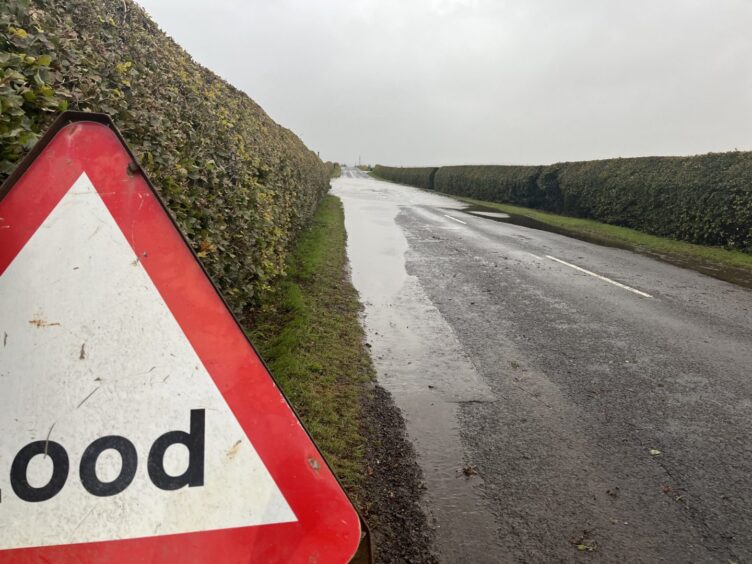 Flooding left on roads in Kirriemuir following Storm Babet.