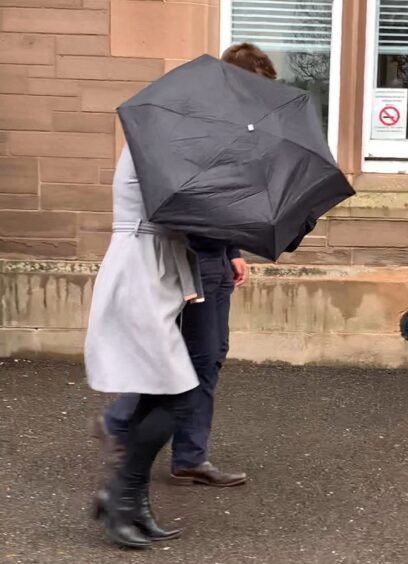 Jack Elder behind umbrella