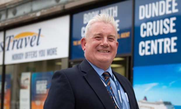 John Stewart outside Hays Travel in Dundee. Image: Kim Cessford/DC Thomson.