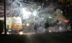 Fireworks were thrown during last year's Kirkton riots. Image: Kim Cessford/DC Thomson