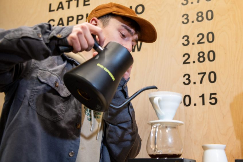 Dundee barista Lewis making a pour over coffee with the Stagg EKG kettle.