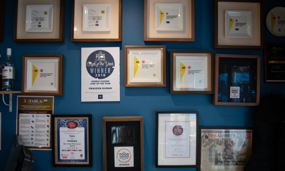 Awards on the wall at Tabla in Perth.