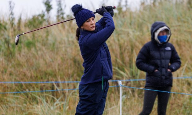 CR0044970, Claire Warrender, Carnoustie. Dunhill Links . Picture shows; Catherine Zeta Jones tees off at the 4th hole during the 1st round of the Dunhill Links over Carnoustie Links
Thursday 5th October, 2023. Image: Kenny Smith/DC Thomson