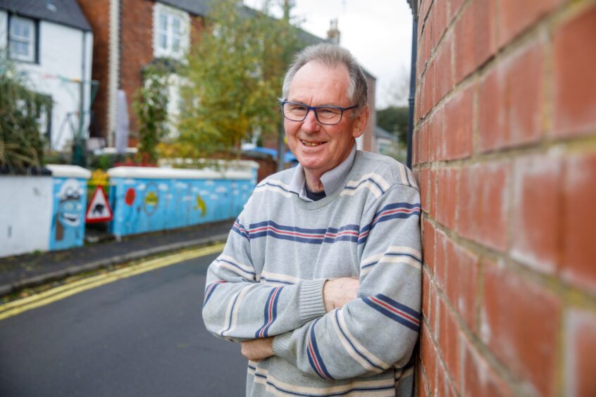 Errol Resident, John Mackay, was deemed not to have breached planning regulations with his mural.