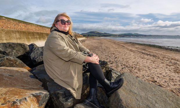 Tracy Clyne on Leven beach, one of her favourite places in the world.
