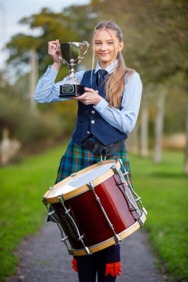 Flora McNab with drum and trophy