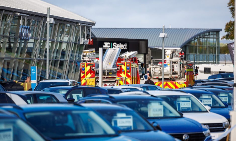 Fire engines at Cameron Motors in Perth following a fire.