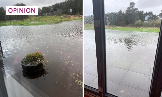 Floodwater surrounding Martel's home. Image: Martel Maxwell