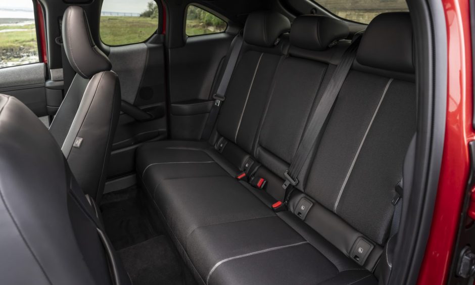 Space in the back is tight. Image: Mazda.
