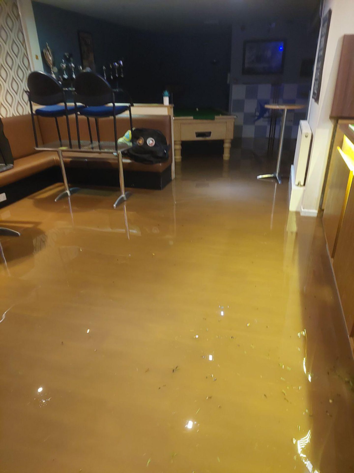 Flooding inside Fairfield Social Club, Dundee. 