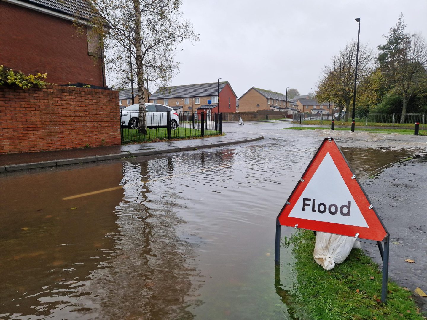 'Flood' sign on a street in Ardler during Storm Babet.