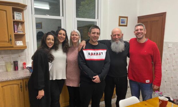 Humza Yousaf's wife Nadia El-Nakla, second from left, with her sister Sara, mum Elizabeth who is in Gaza, brother Ramsay, dad Maged also in Gaza, and brother Naal. Image: Nadia El-Nakla.