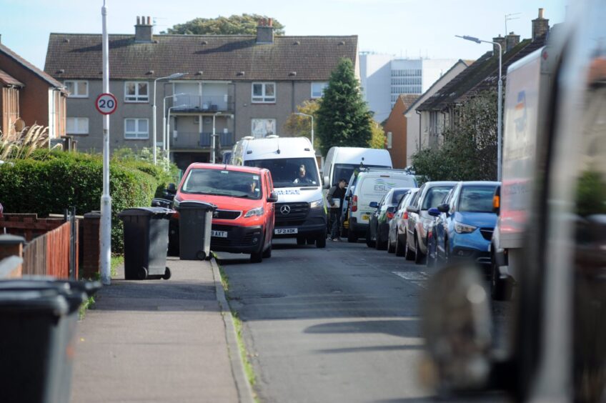 Police presence as forensics officers search property in Kirkcaldy