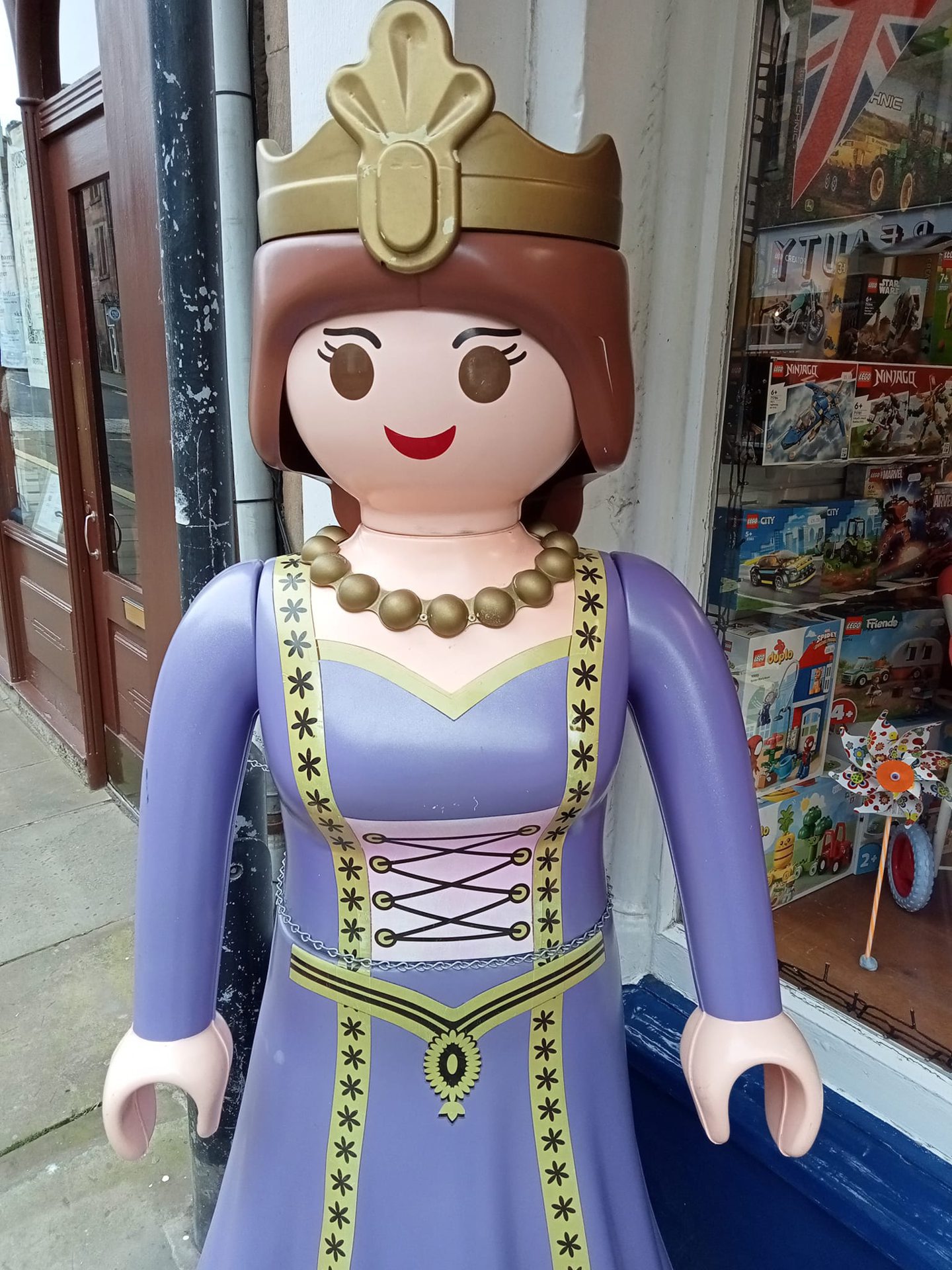 Princess Poppy outside the shop