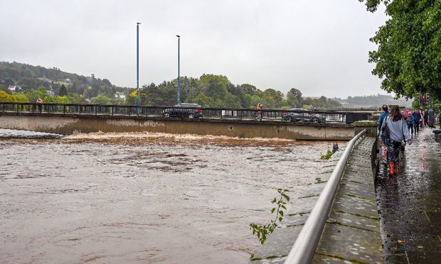 Queen's Bridge in Perth with high water levels.