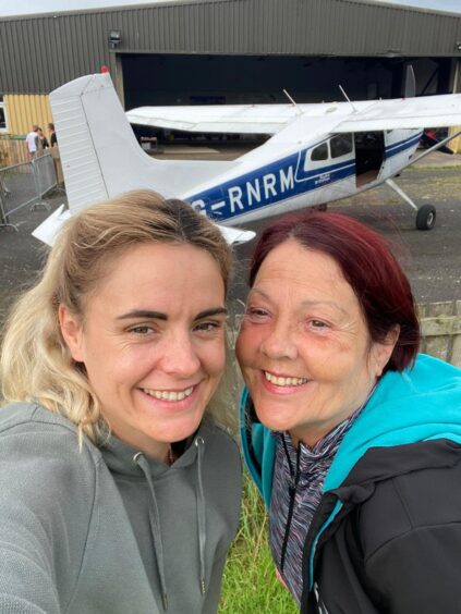 Kirkcaldy Rosemarie Broadley is blind after being woken from a diabetic coma. She is pictured with her daughter Samantha at skydiving experience together in Glenrothes