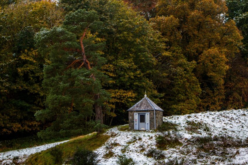 Earthquake House on hillside above Comrie.