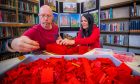 Sculptor Alistair Jelks and writer Gayle Ritchie build a replica of Arbroath Abbey out of Lego. Image: Steve MacDougall.