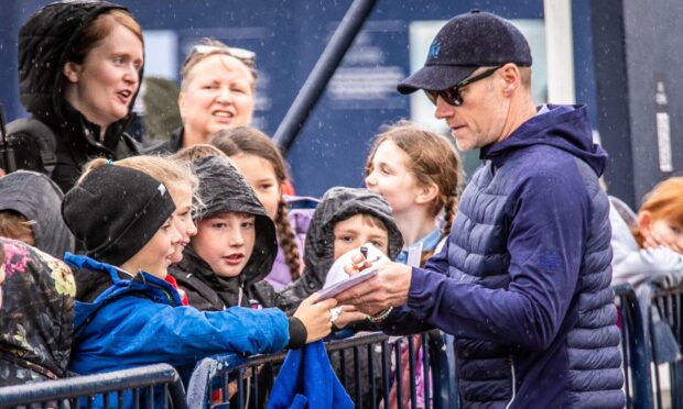 Ronan Keating signs autographs during a previous visit to the Dunhill Links Championship. Image: Steve Brown/DC Thomson