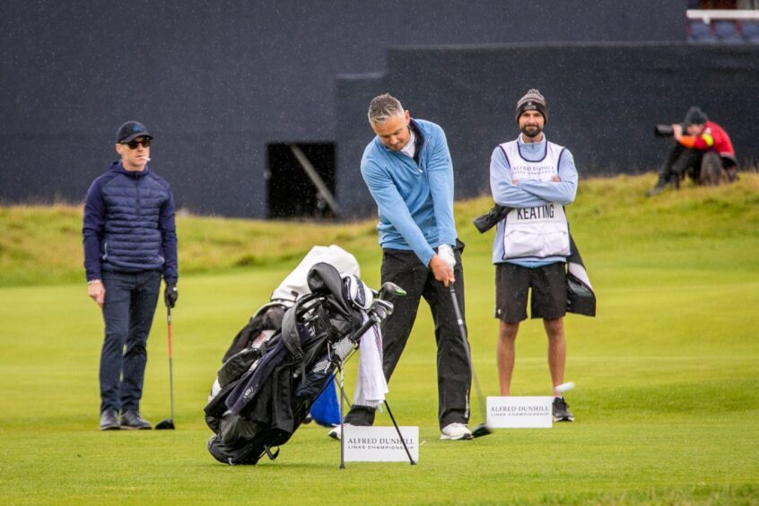 Dunhill Cup celebrities - Keane frontman Tom Chaplin tees off, watched by Ronan Keating. 
