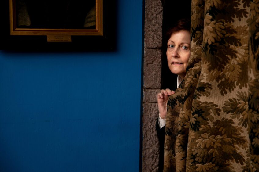 Tour guide Gail Renwick in King Malcolm's Room at Glamis Castle.