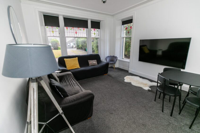 The downstairs living area at Inspired breaks in Leven.