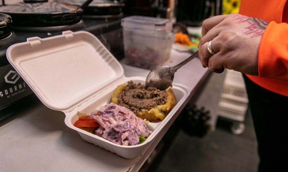 A takeaway box of baked potato with haggis from Nimmos in Kirkcaldy.