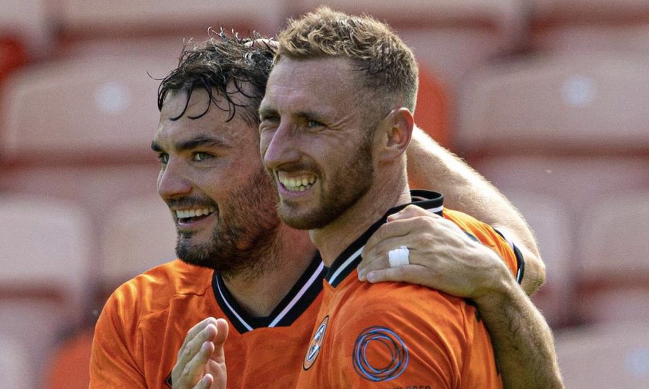 Tony Watt, left, and Louis Moult celebrate for Dundee United