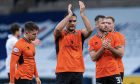 Dundee United players take the acclaim of around 3,200 travelling Arabs