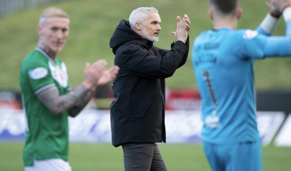 Jim Goodwin takes the acclaim of the Dundee United fans