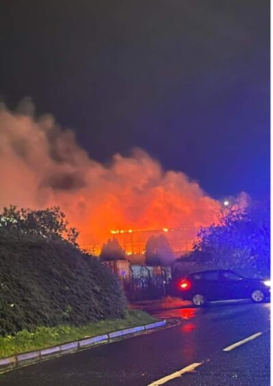 Blaze rips through old JWT building at industrial estate in Dundee.