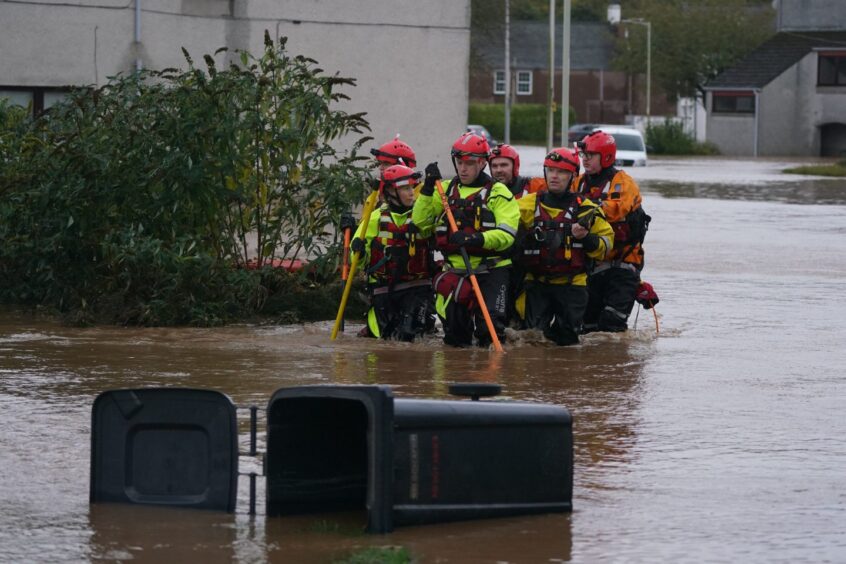 Emergency services rescuing people in Brechin