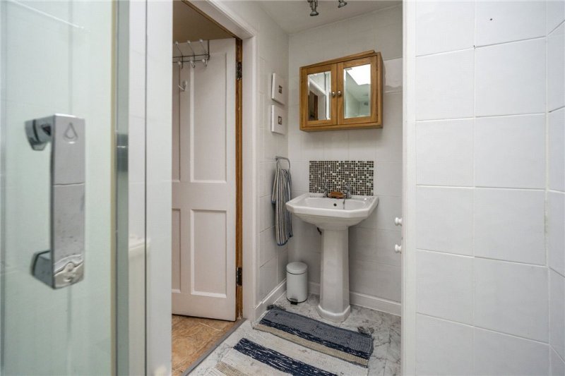 The shower rooms sits off the second bedroom. 