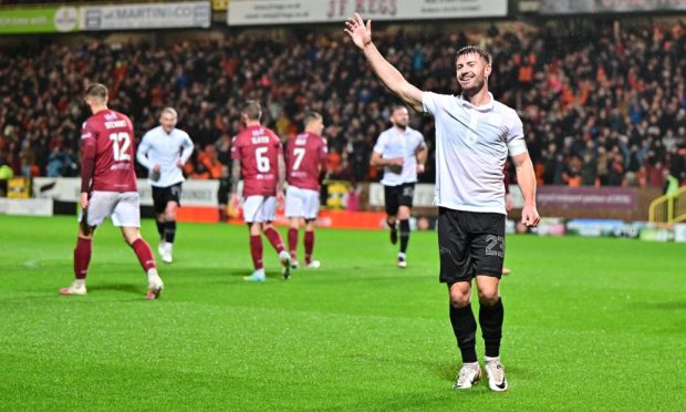 Ross Docherty celebrates his first Dundee United goal.