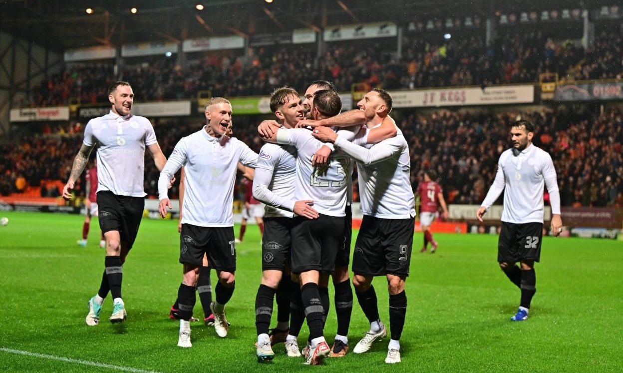 Dundee United players celebrate against Arbroath.