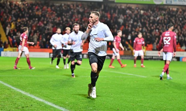 Dundee United's Louis Moult celebrates his opening goal against Arbroath