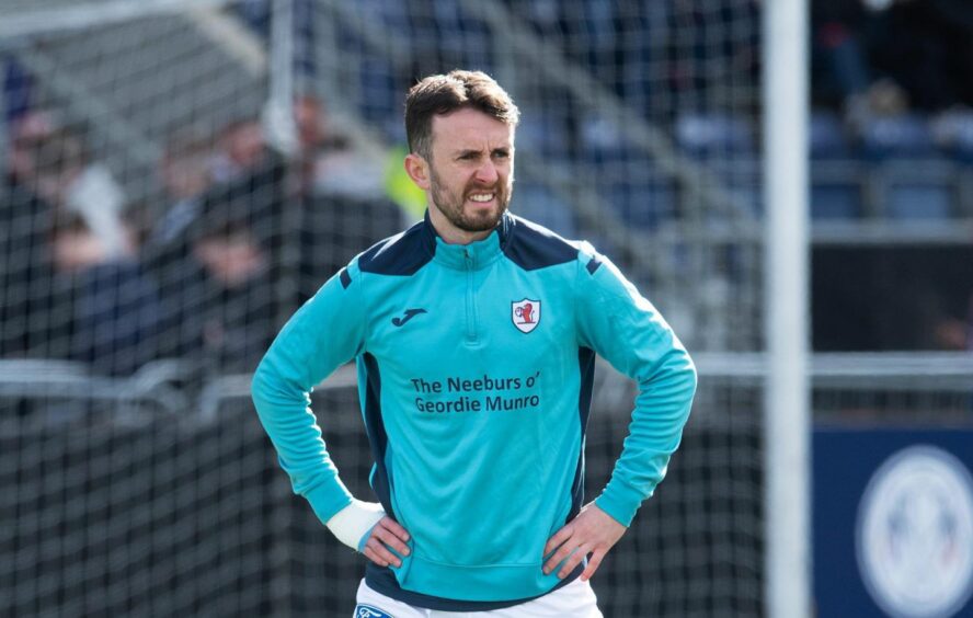 Aidan Connolly warms up for Raith Rovers.