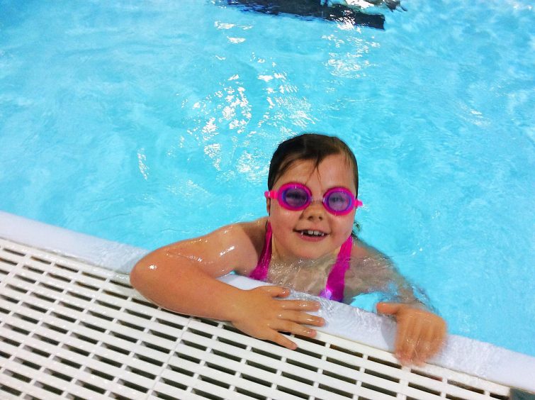 Girl in swimming pool