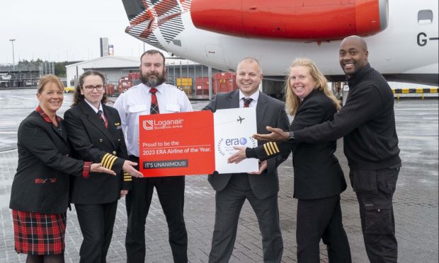 Claire Forrester, cabin crew, Annag Bagley, captain, Craig Young, first officer, chief executive Jonathan Hinkles, Rebecca Simpson, training captain and Edwin Muzaale, line engineer. Image: Big Partnership