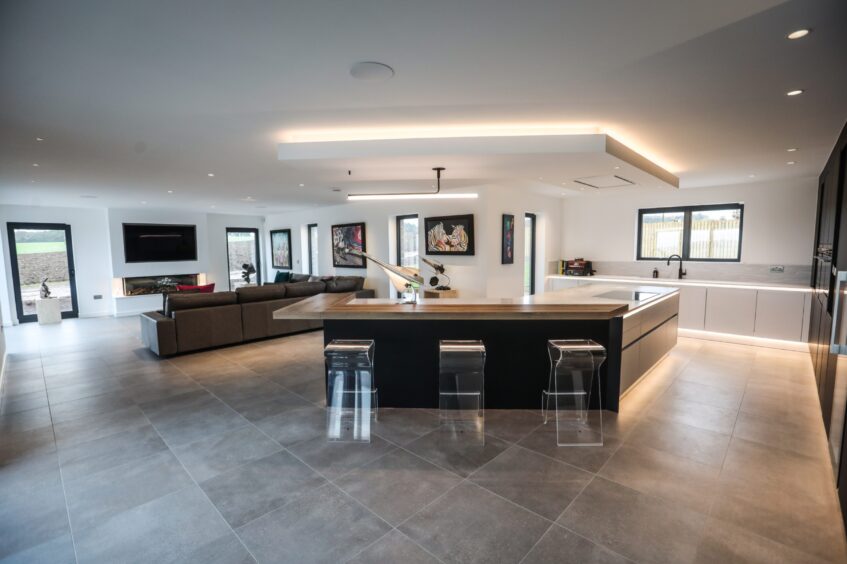 The open plan living/dining/kitchen area