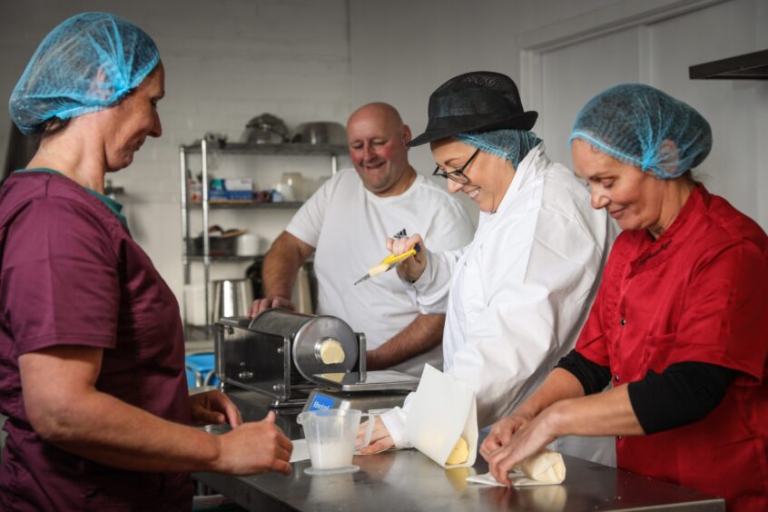 Janette, Hamish, Kim and Moragh packaging up the Bothy Butter.